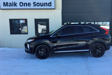 Black 2019 Mitsubishi Eclipse Cross with professional window tint at Maik One Sound in North Bay Ontario